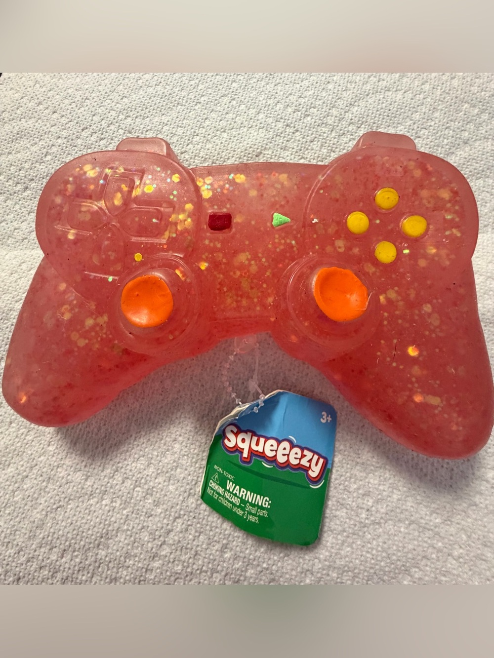Pink Game Controller Stress Reliever with Orange Accents